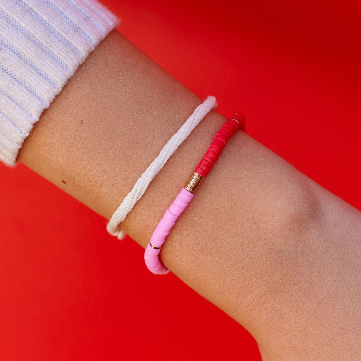 Pura Vida Pink and Red Vinyl Disc Bead Stretch Bracelet Set - styled view
