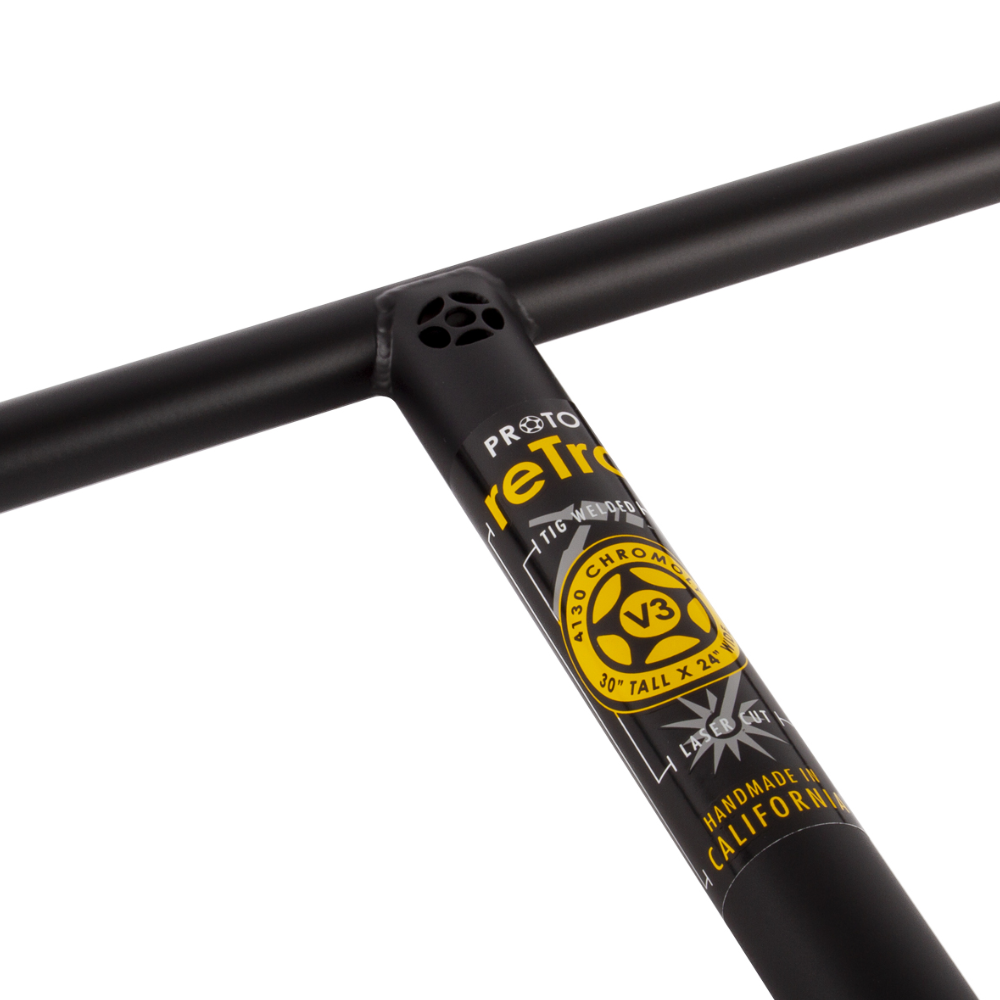 PROTO reTro Lites V3 handlebars come in at 30″ tall x 24″ wide, making it one of the largest “T” bars in the industry. Not only did the PROTO retro V3 increase substantially in width and height from the V2, it also increased the thickness of the 4130 chromoly tubing used for the crossbar and the steering column to increase strength. These reTro’s come with a flat black powder coat.  PROTO - Retro Lites V3 Colour: Flat Black Picture Position: vertical PSHBRTV3FB